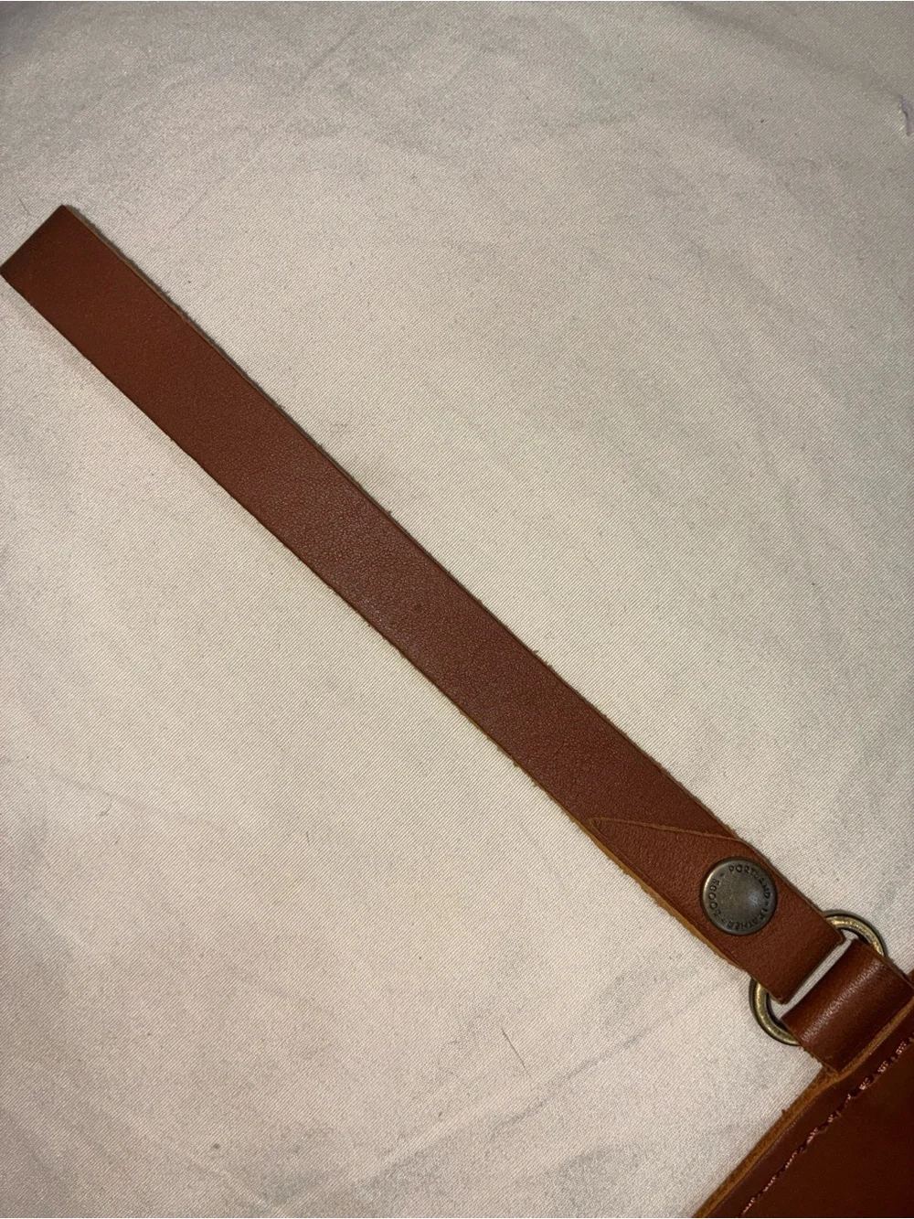 Portland Leather Goods brown leather wristlet zipper pouch with removable strap